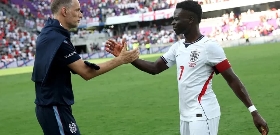 Coach and player exchanging handshakes after match