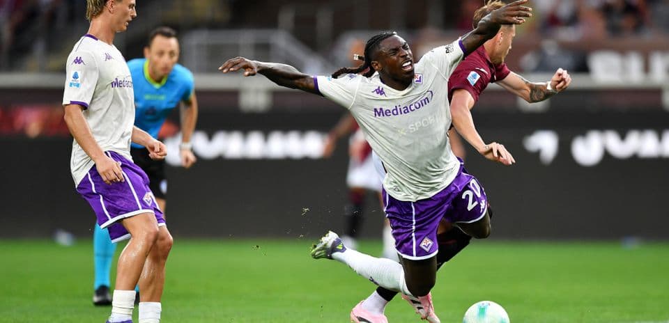Moise Kean and Ivan Ilic during match.