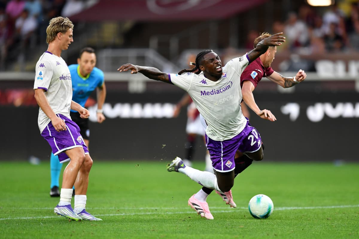 Moise Kean and Ivan Ilic during match.