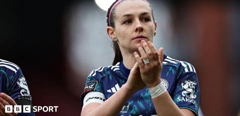 Player applauding fans after a match