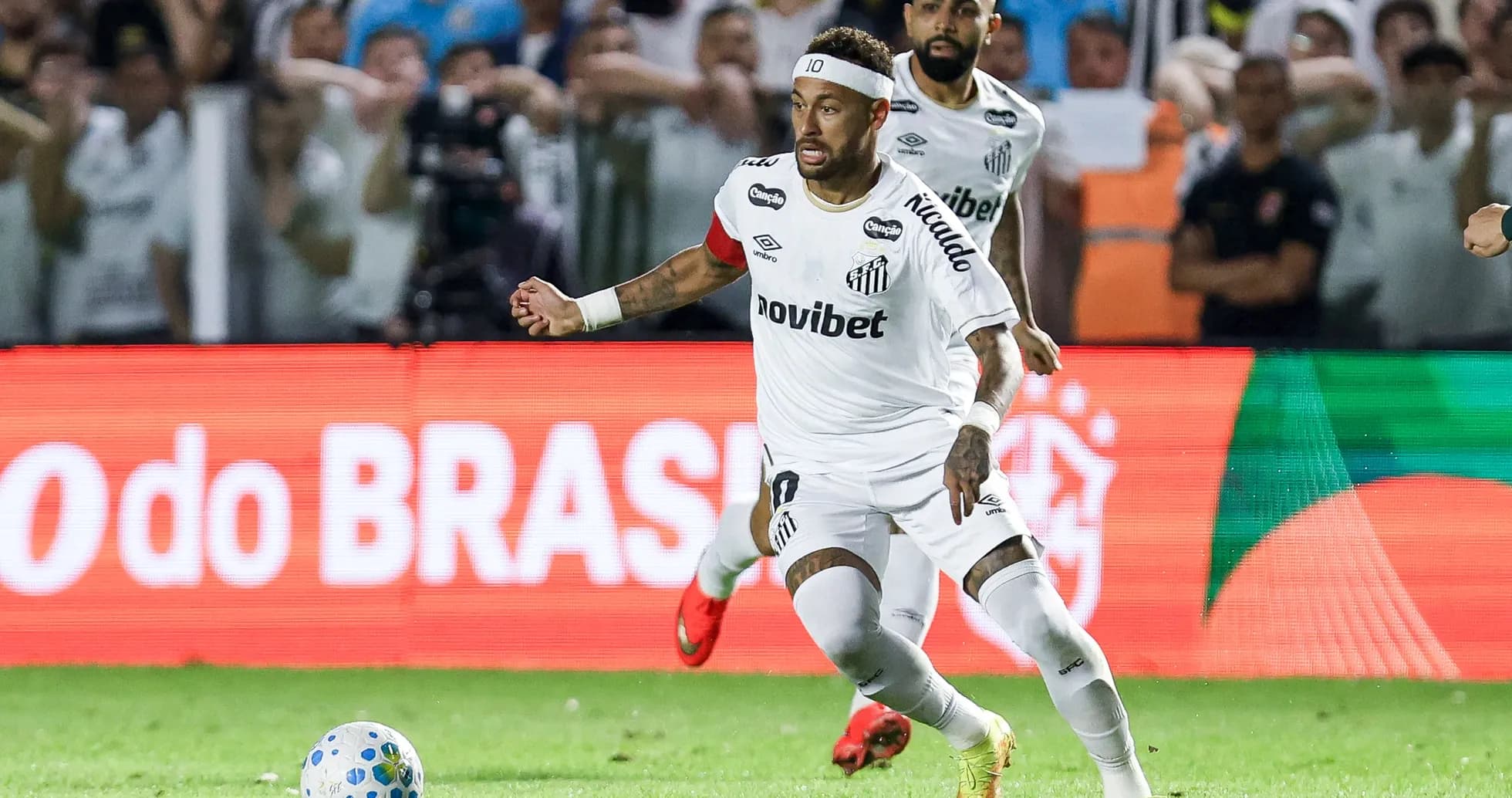 Neymar dribbling the ball during a match