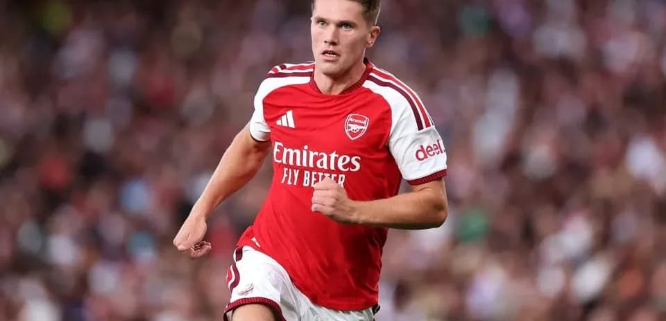 Player running during a match for Arsenal