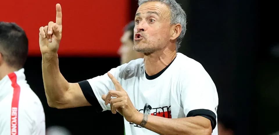 Coach gesturing during match from the sidelines