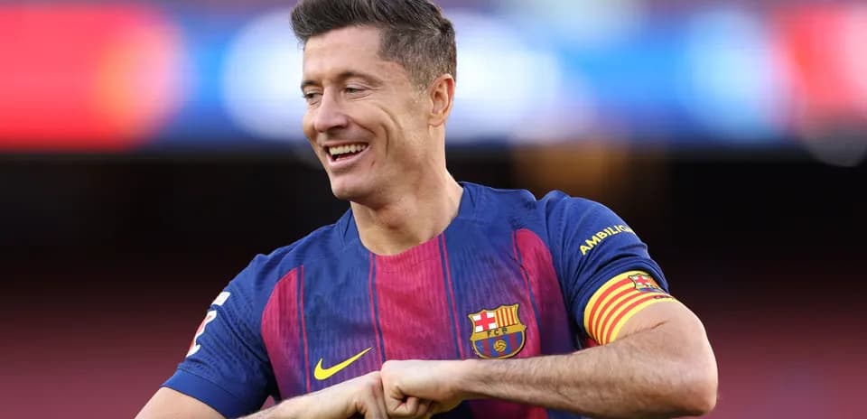 Player in Barcelona kit smiling during warm-up