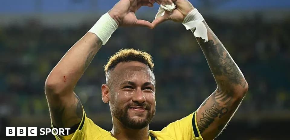 Neymar celebrating with heart gesture during match