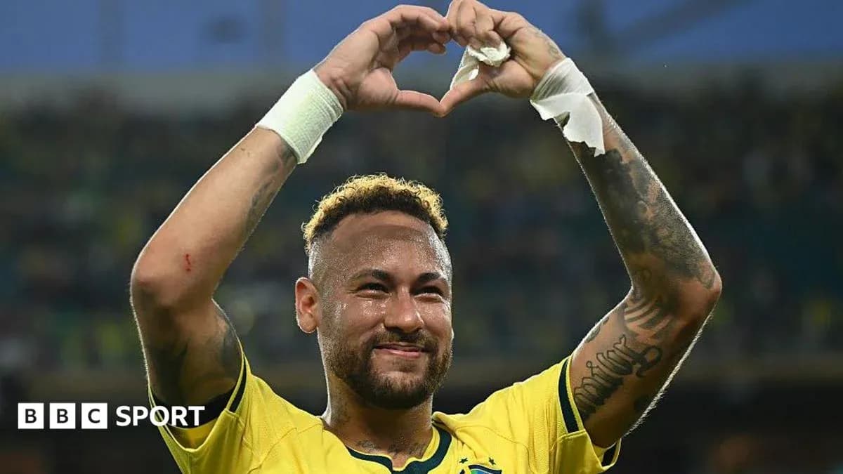 Neymar celebrating with heart gesture during match