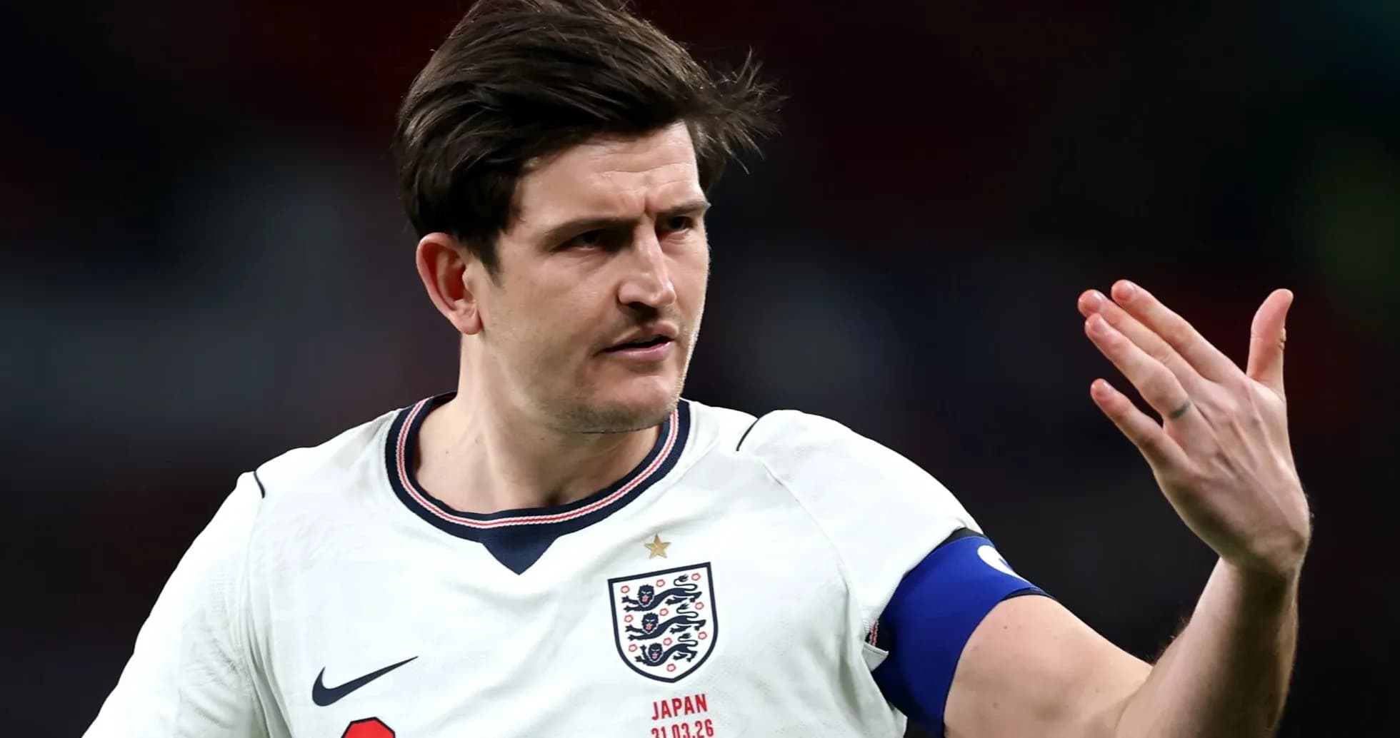 Player gesturing during England football match