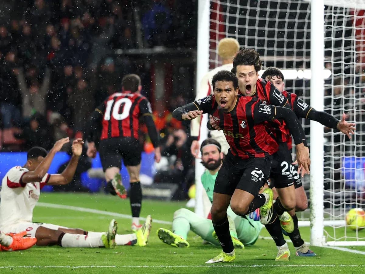 Bournemouth players celebrating a goal against Liverpool
