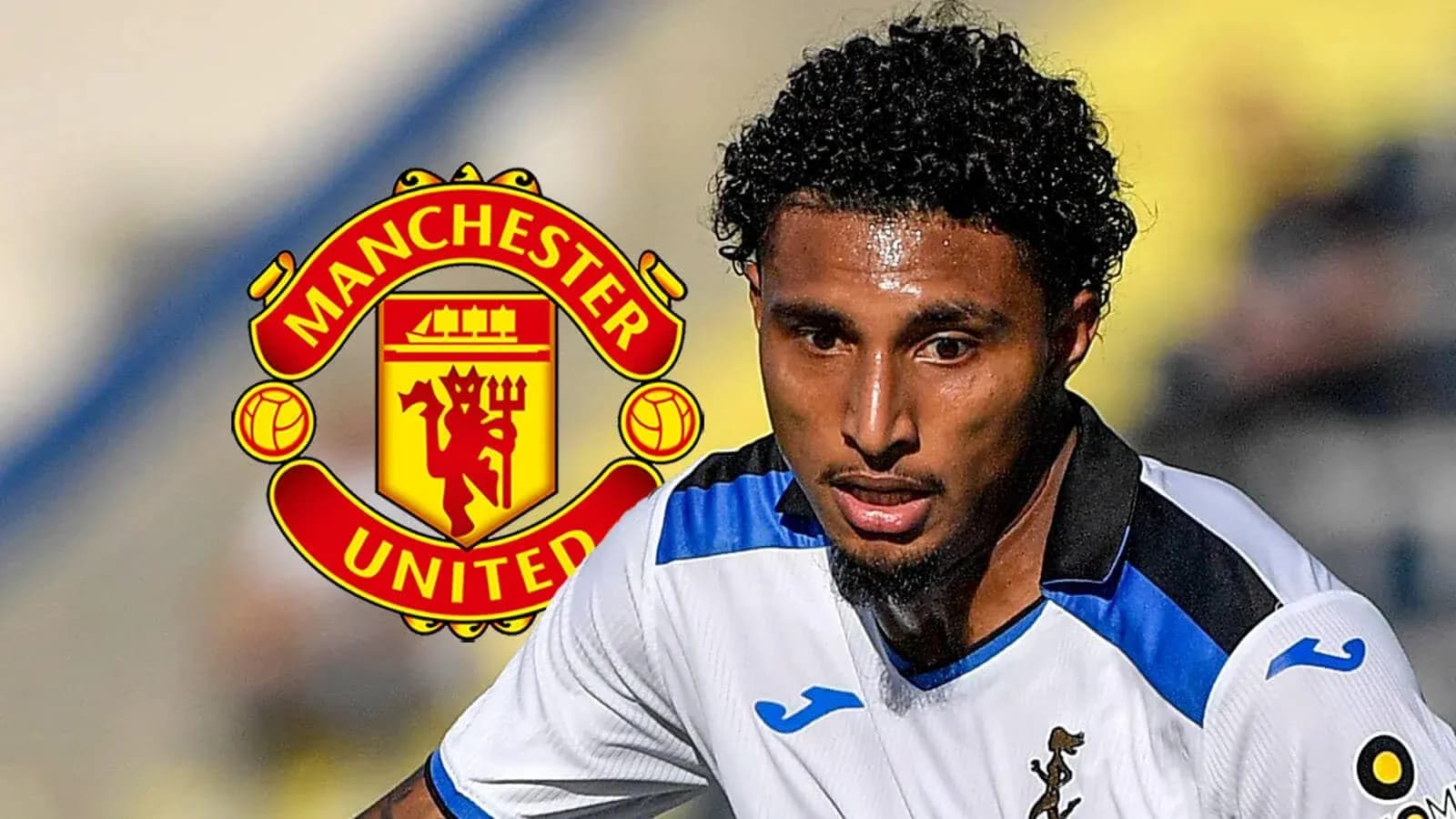 Player in action with Manchester United logo background