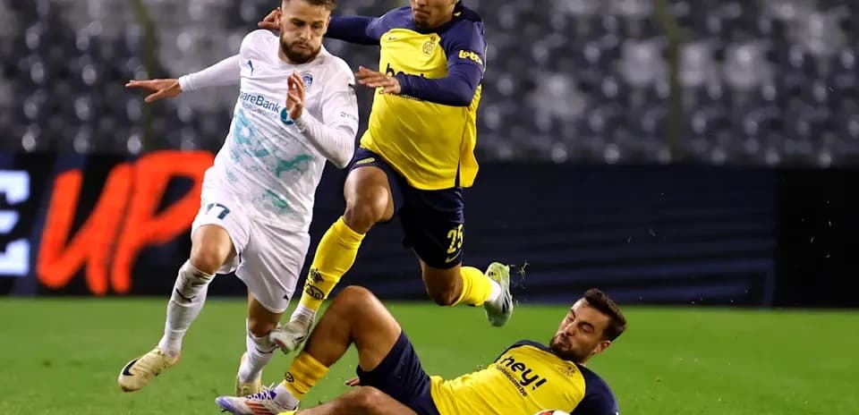 Player dribbling past opponents during a match