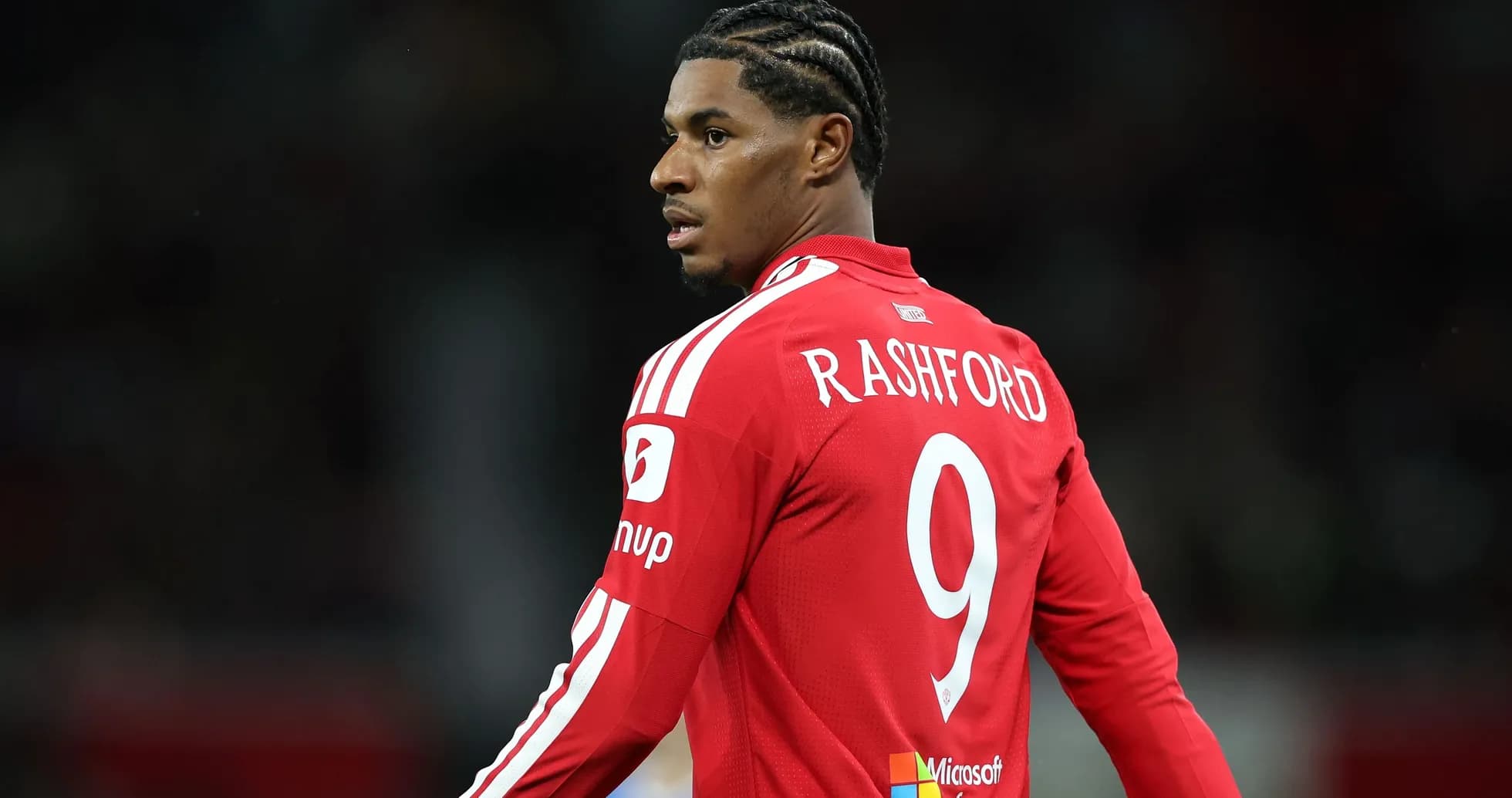 Player in red jersey with 'RASHFORD' and number 9