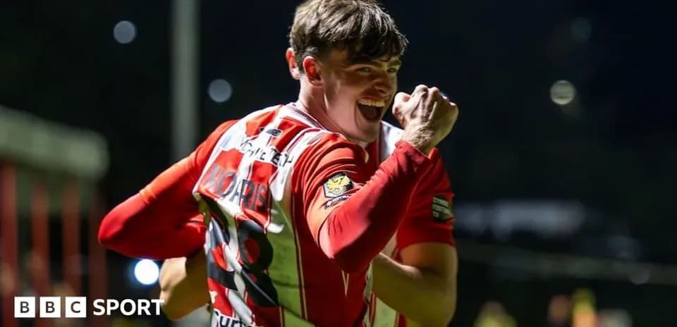 Player celebrating a goal with clenched fist