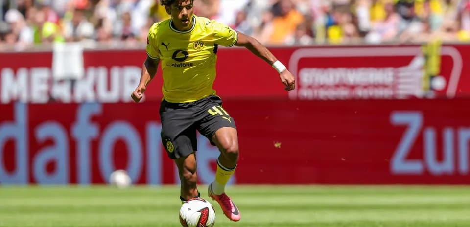 Player dribbling the ball during a match