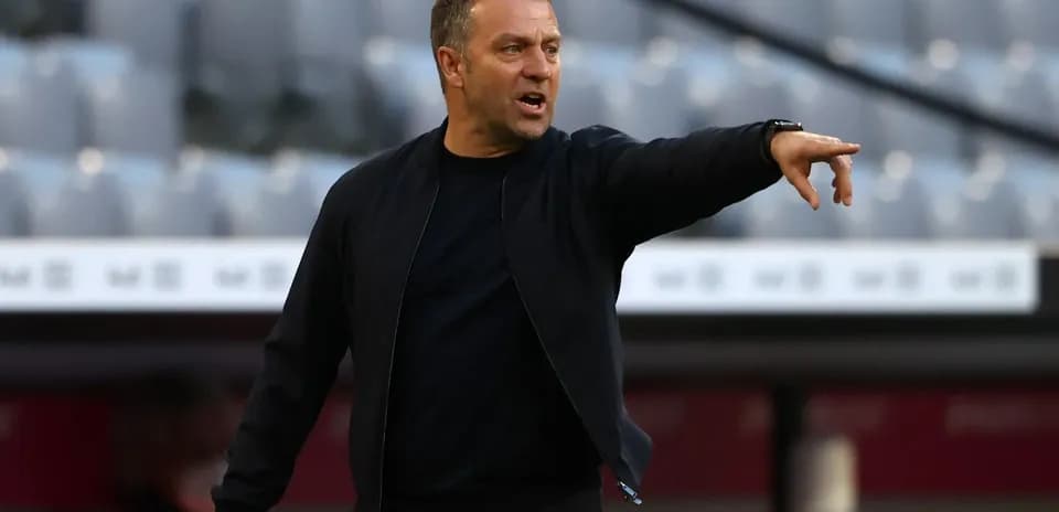 Coach directing players from the sidelines during match