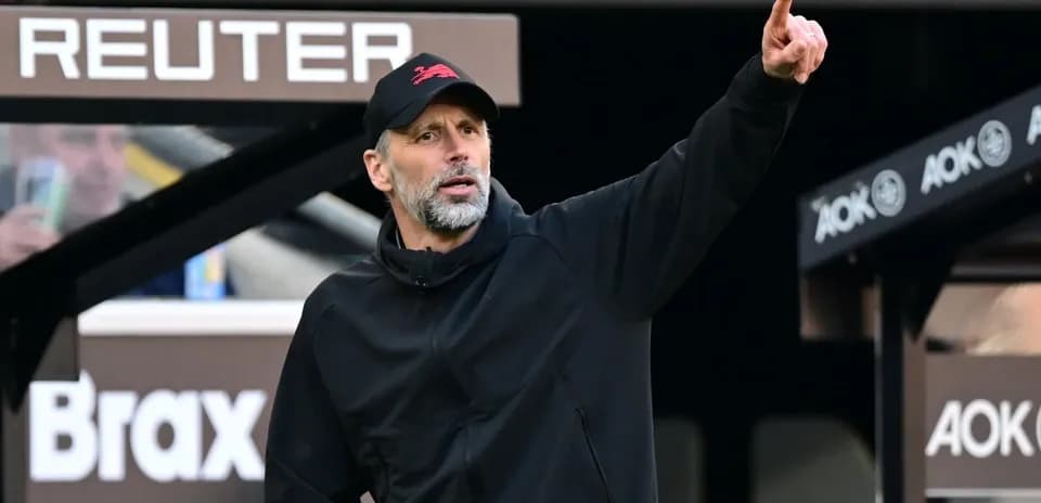 Coach giving instructions from the sidelines