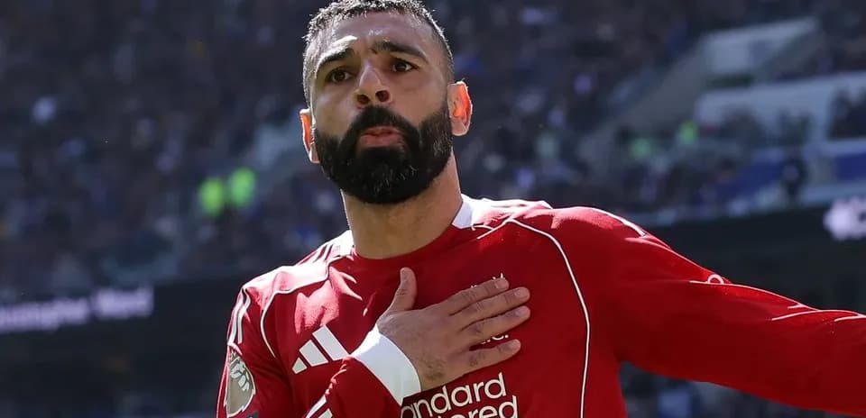 Player celebrating with hand over heart gesture