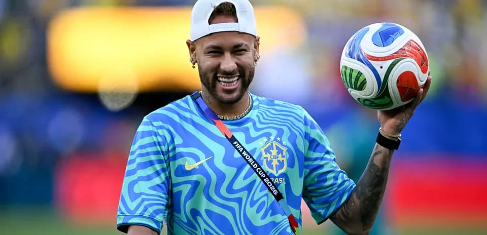Player holding a soccer ball at the stadium