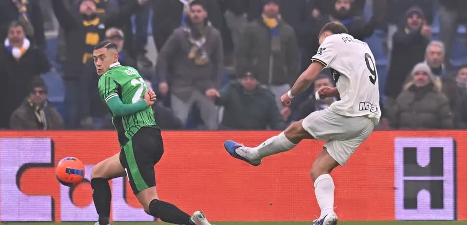 Player shooting during Parma vs Sassuolo match