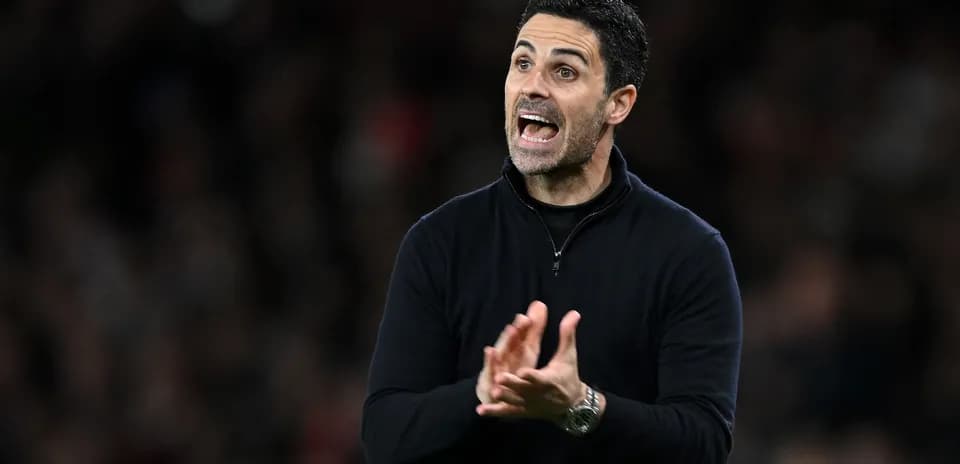 Manager gesturing during a football match on sideline