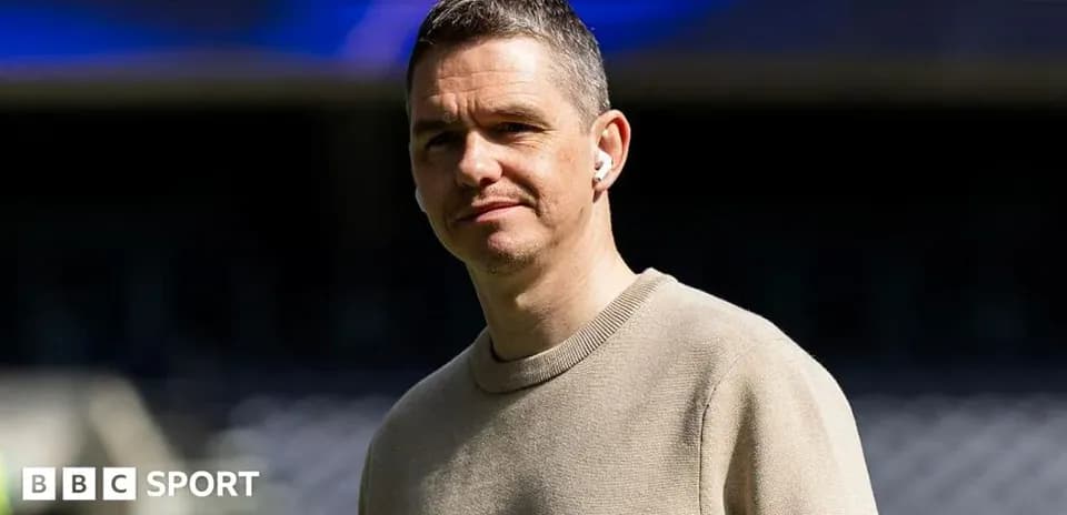 Person wearing headphones on sports field