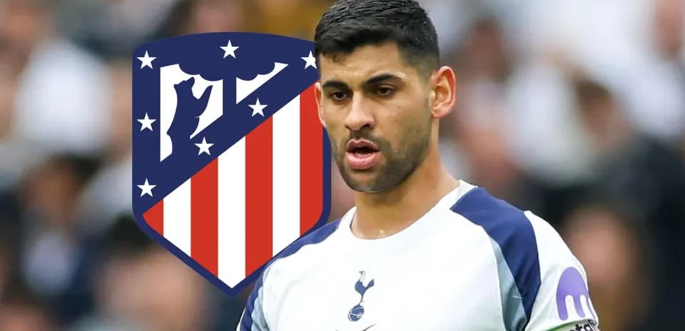 Player in Tottenham kit with Atlético Madrid logo background