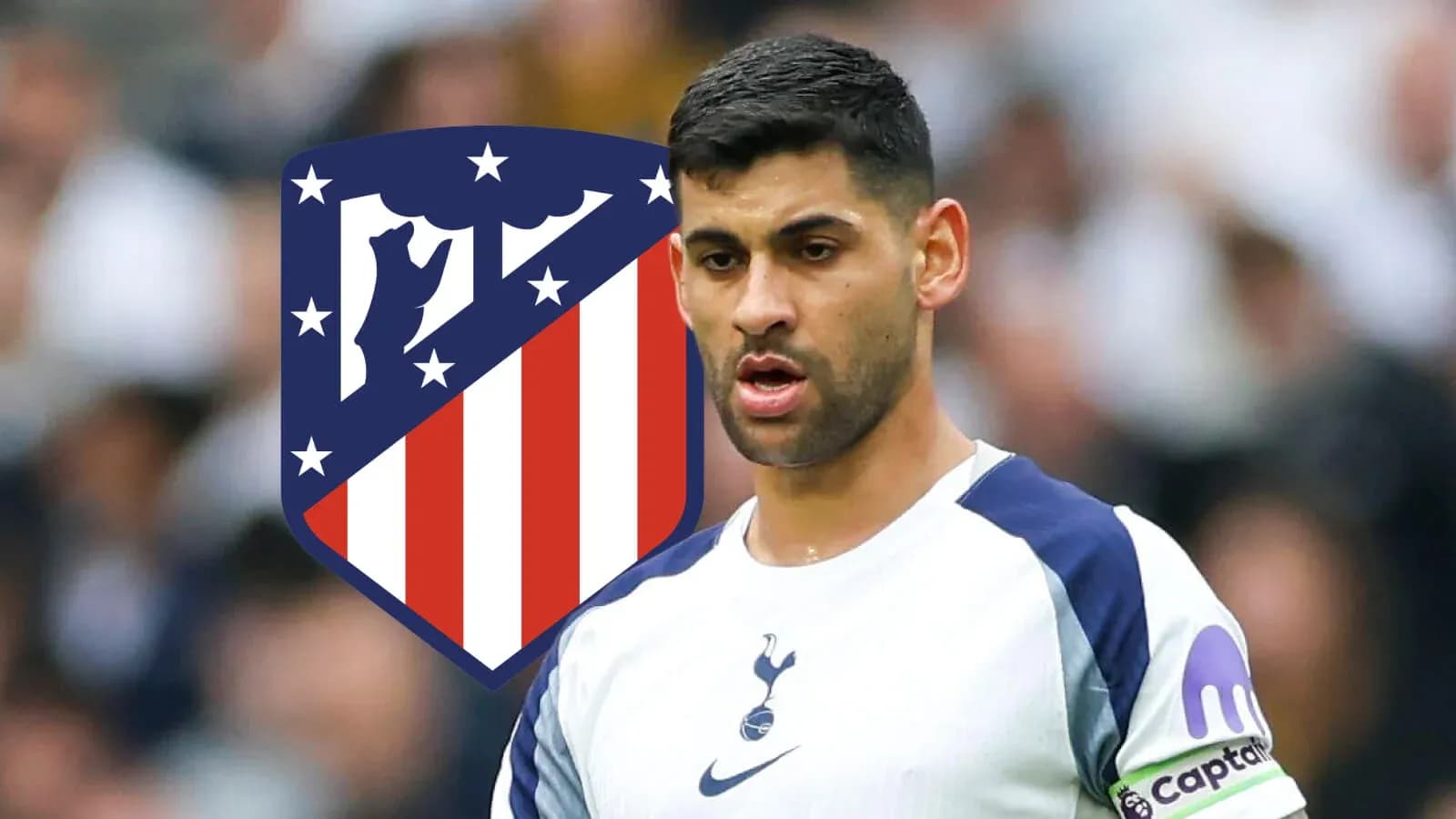 Player in Tottenham kit with Atlético Madrid logo background