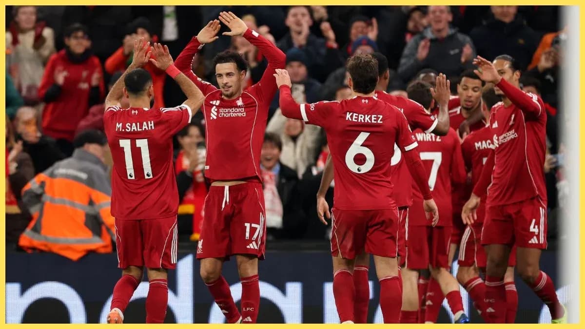 Liverpool players celebrating a goal during match