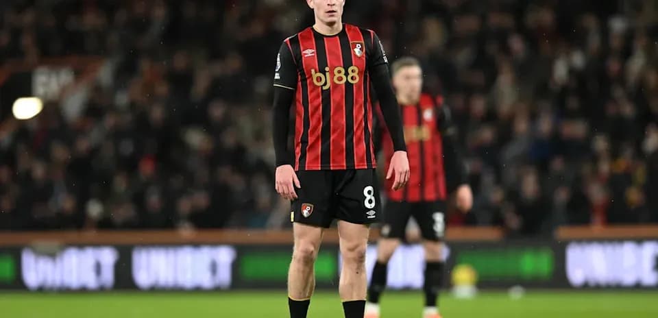 Bournemouth player standing on the pitch during match