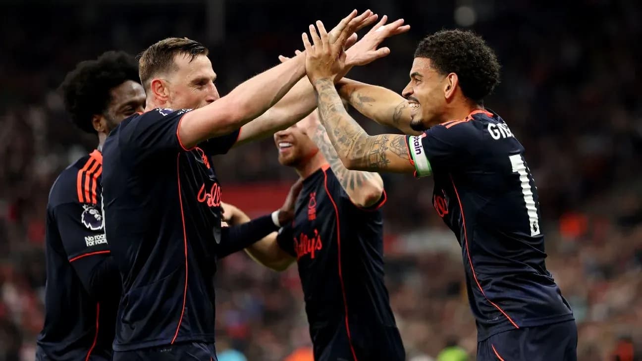 Players celebrating a goal during match