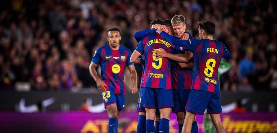 Barcelona players celebrating a goal