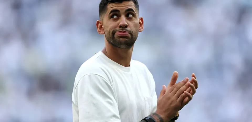 Player clapping during pre-match warm-up