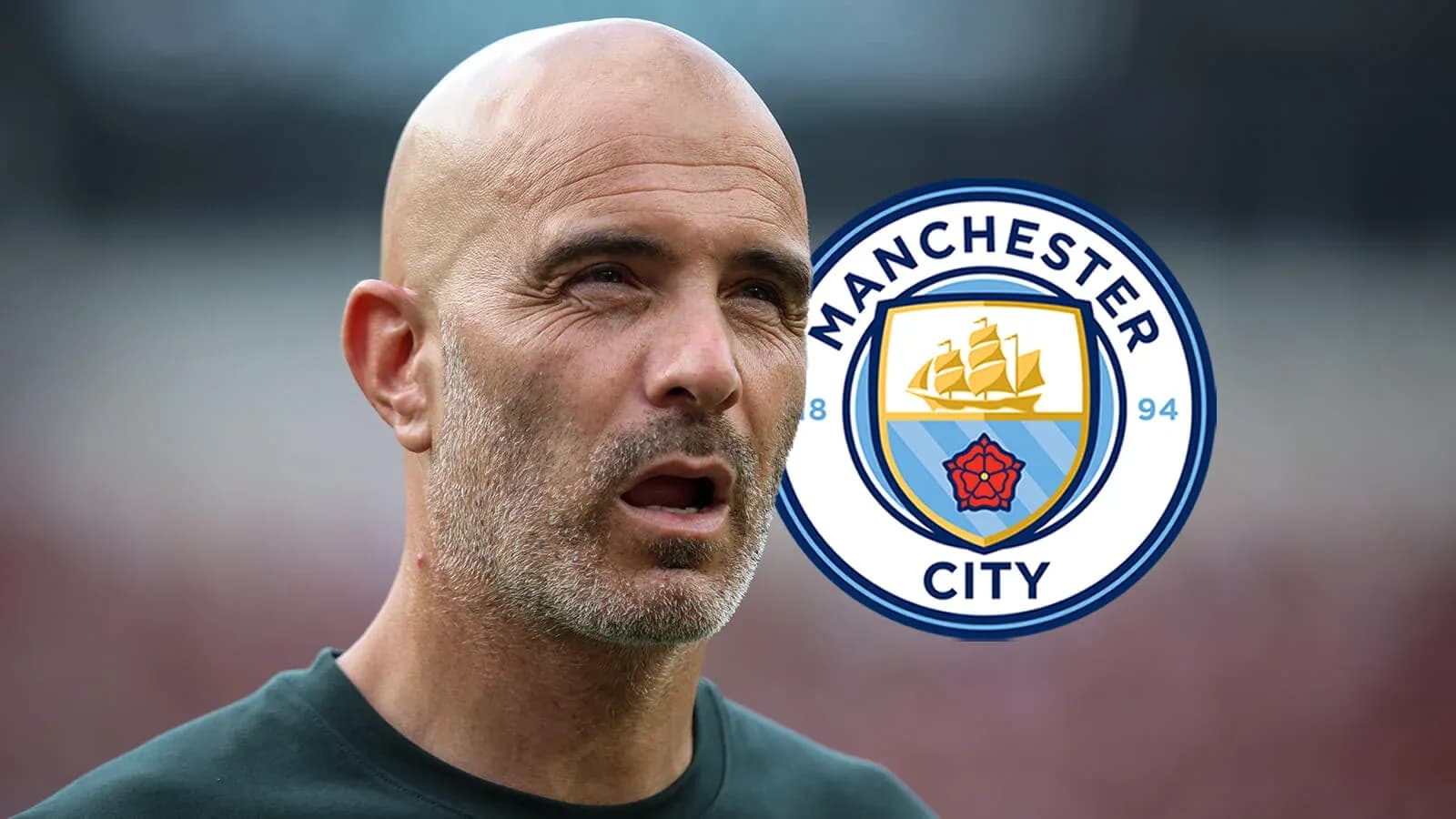 Manager with Manchester City logo in background