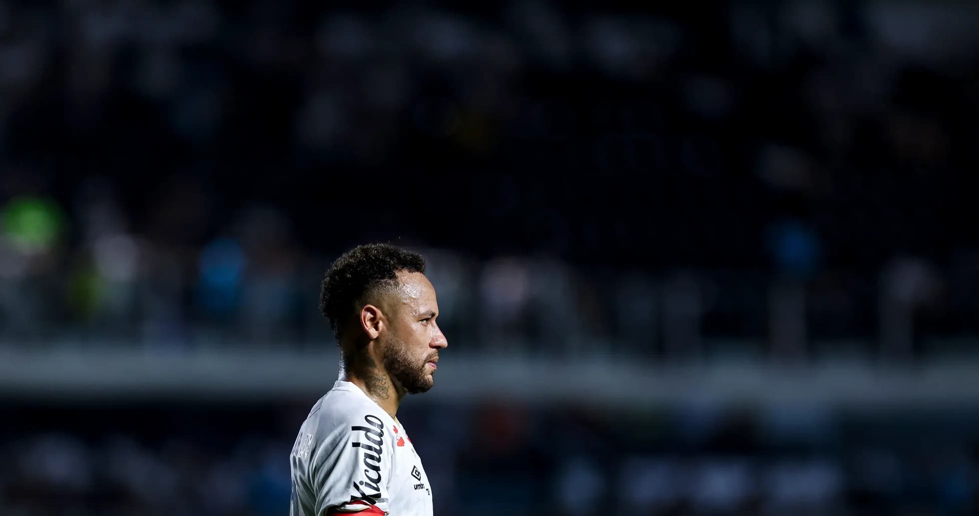 Player in profile during match at stadium