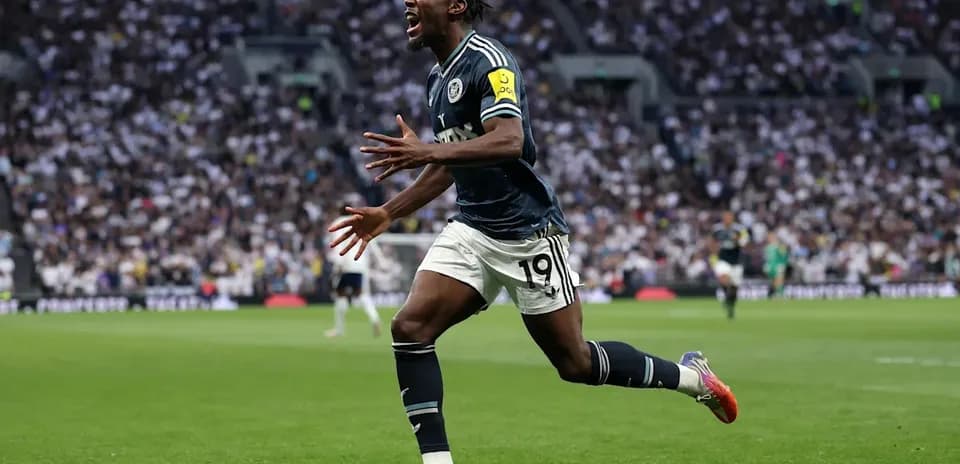 Player celebrating after scoring a goal during match