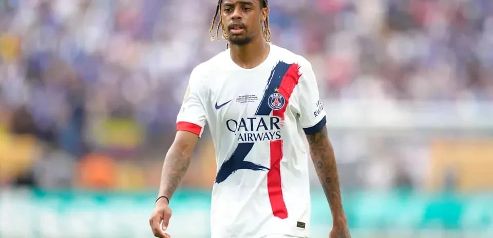 Player walking on field in PSG jersey