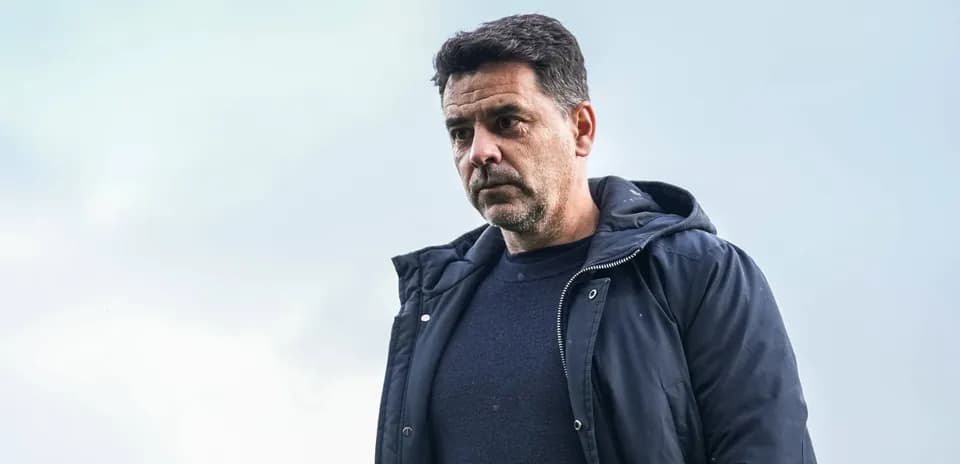 Coach observing the field during training session