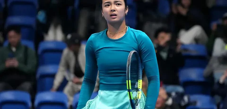 Tennis player holding racket during match