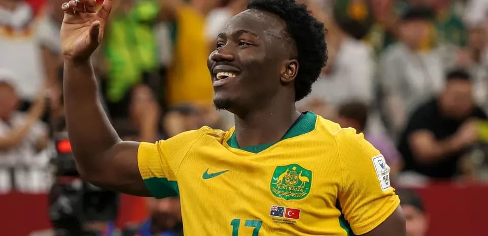 Player celebrating after scoring for Australia