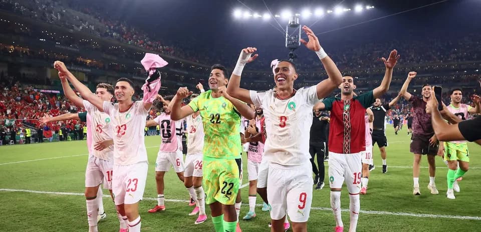 Morocco players celebrating victory at World Cup
