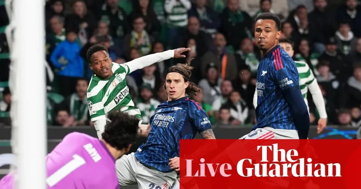 Celtic player attempts a shot with defenders nearby