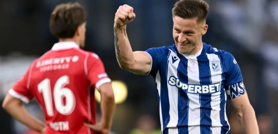 Lech Poznan player celebrating during match
