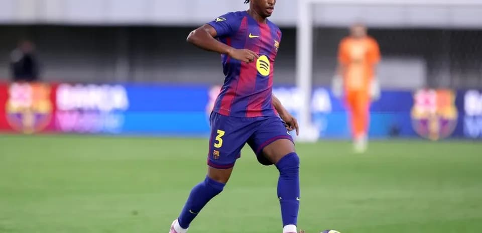 Player dribbling the ball on the field