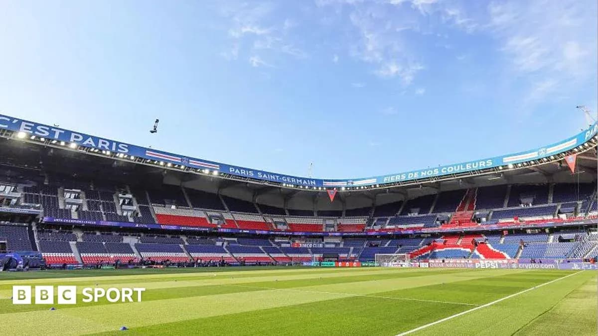 Empty stadium with PSG branding before match