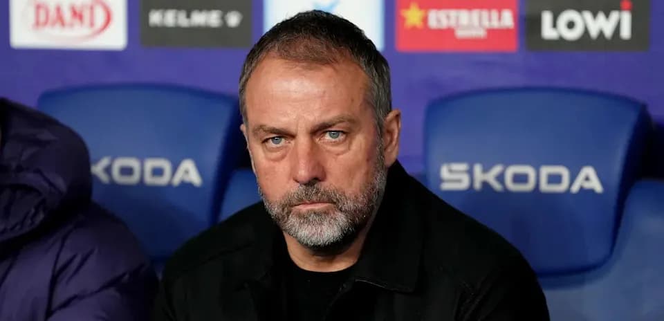Coach sitting on the bench during a match