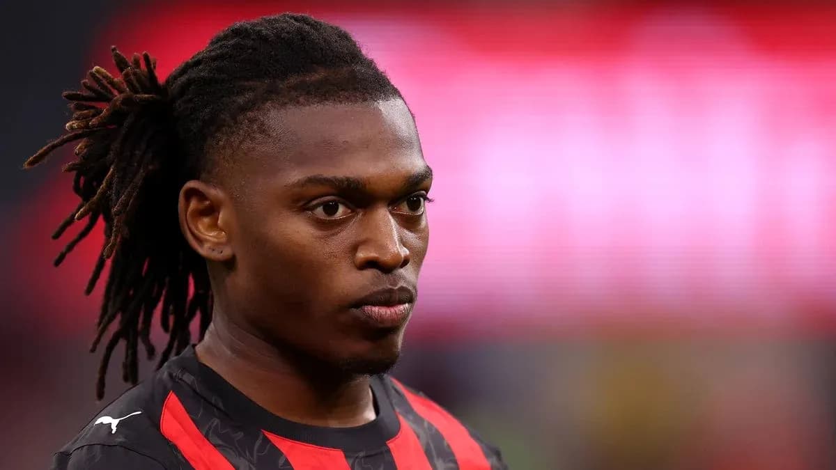 Player with braided hair during match preparation