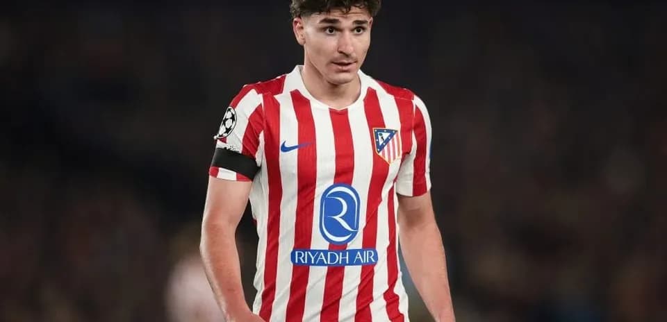 Player wearing Atlético Madrid jersey during match