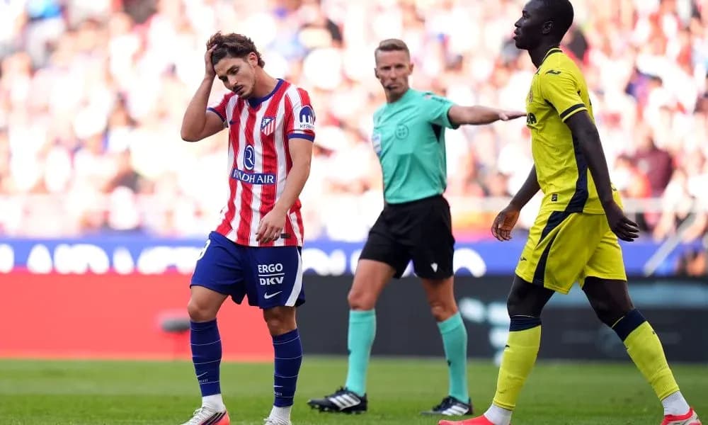 Atletico Madrid player looking frustrated on field