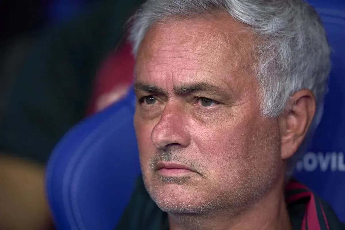 Coach sitting on the bench during a match