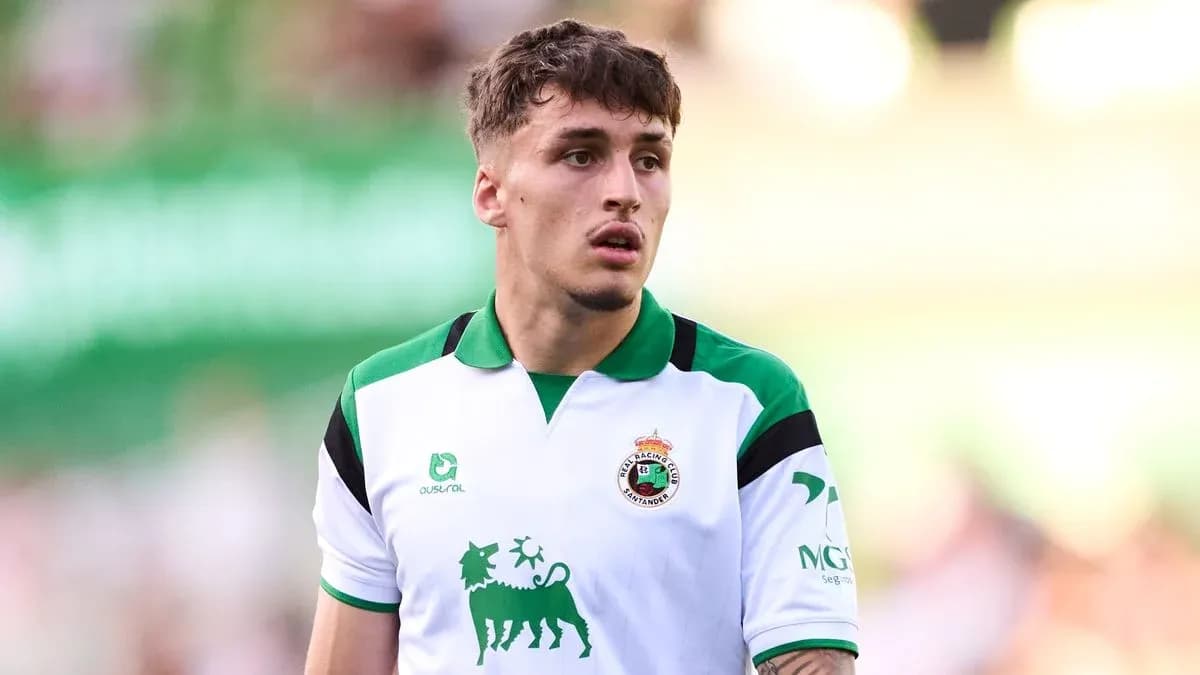 Player wearing Racing Santander jersey on the field