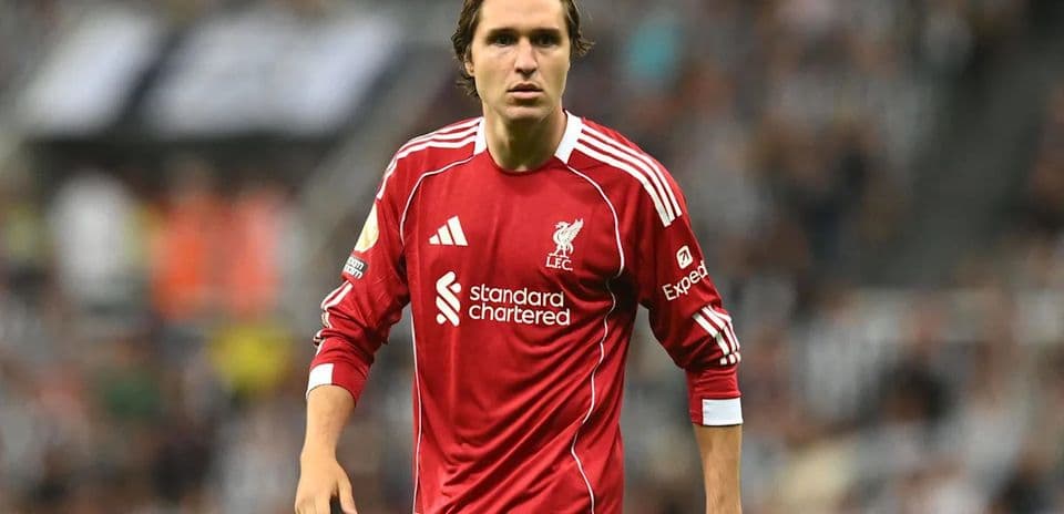 Player in red Liverpool kit during match